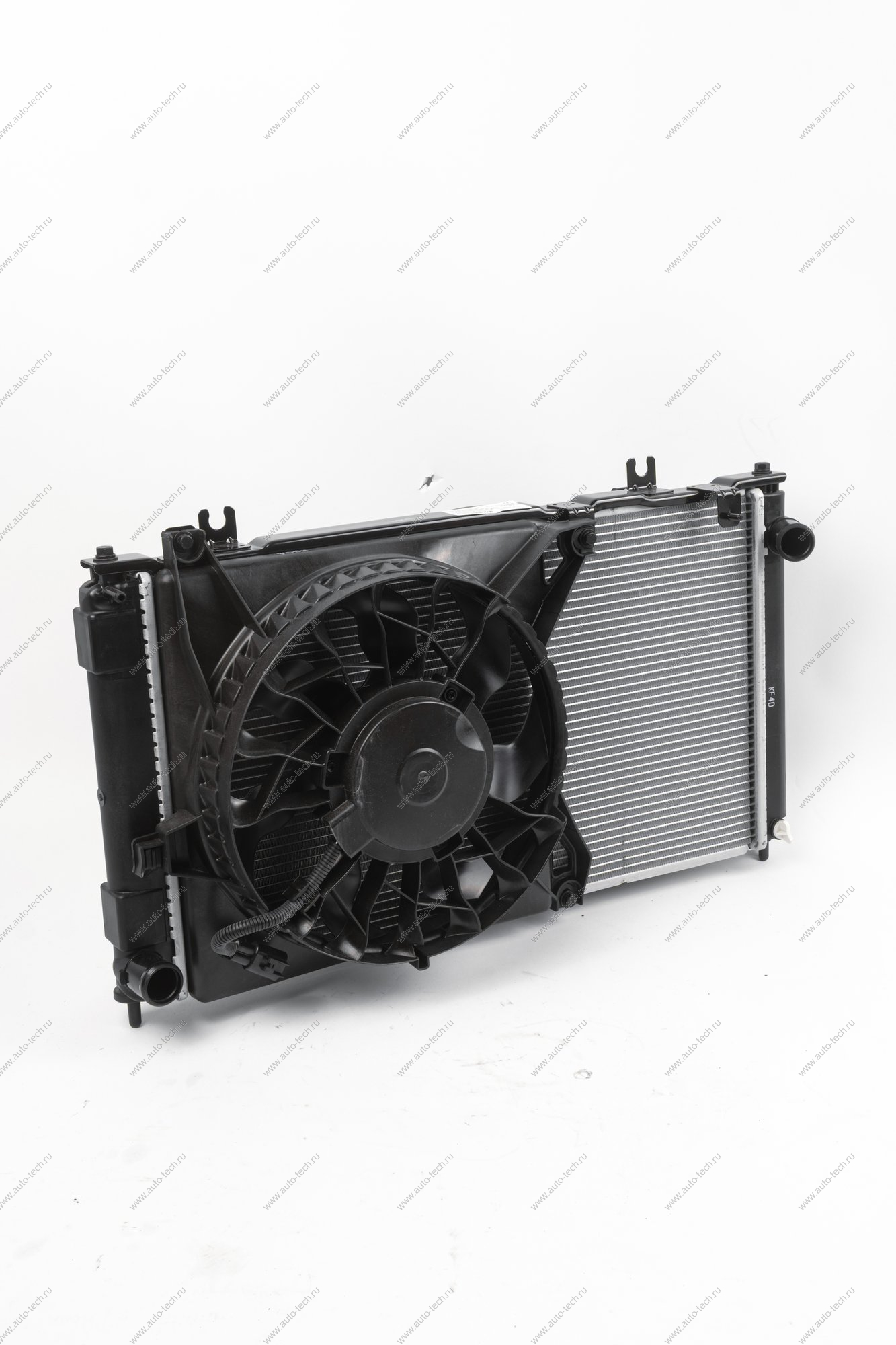 Радиатор охлаждения ВАЗ-2190/daтsun + рад.конд. с эл. вент.(1 спереди+1 сзади) до 2015 г. МКПП в сборе (HALLA) Lada