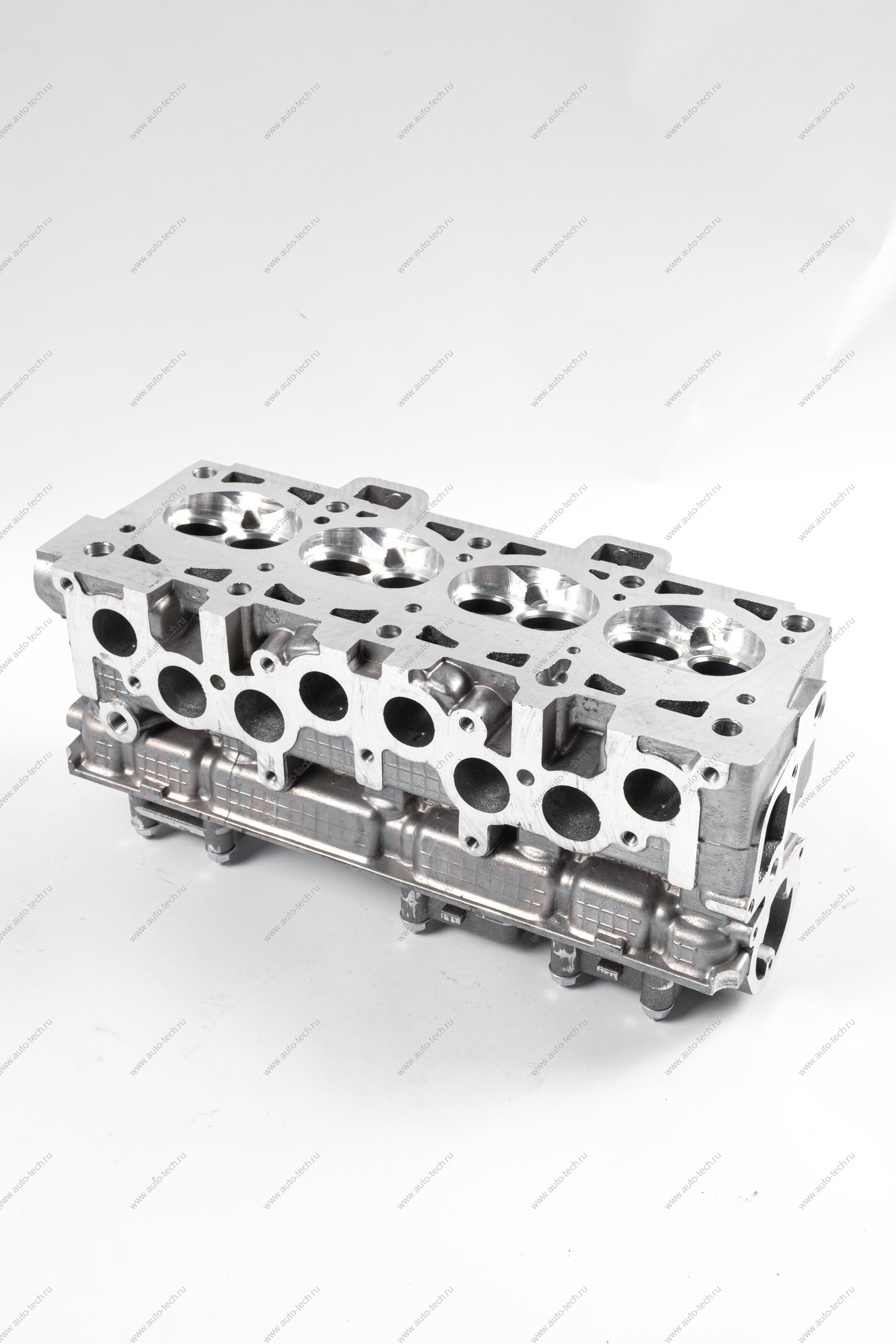 Головка блока цилиндров без шпилек в сборе (с направляющими втулками, без клапанов и вала распределительного) АвтоВАЗ АвтоВАЗ 11186100301100