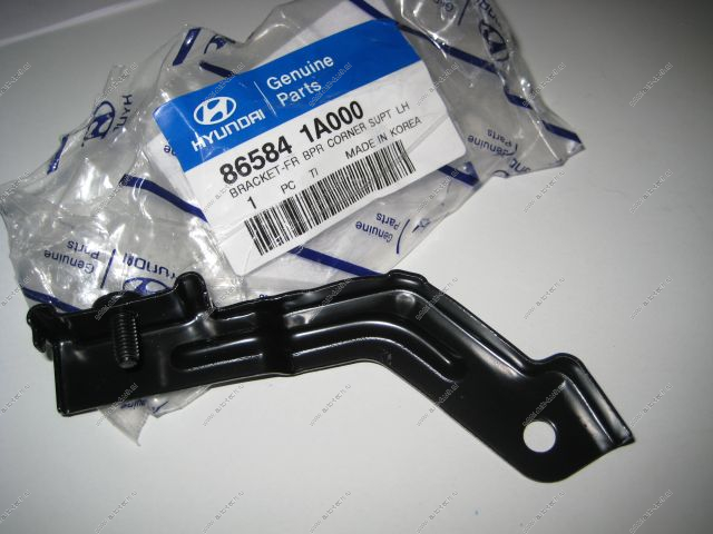 HYUNDAI Accent Кронштейн крепления бампера передний левый MOBIS  86584-1A000