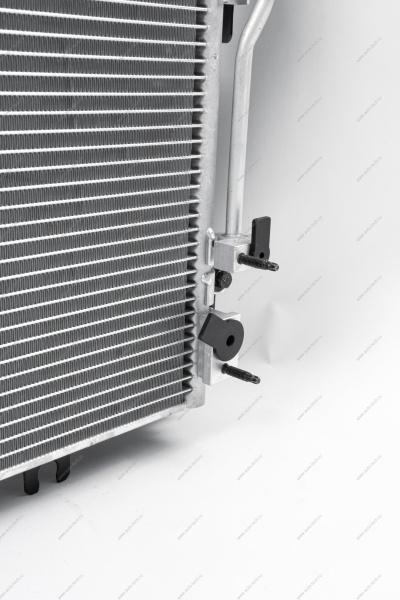 Радиатор охлаждения ВАЗ-2190/Datsun 2015- + рад.конд. с 1 эл. вент.и патрубками МКПП н/о в сборе Lada LADA 8450110795